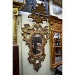 An 18th century carved and giltwood framed small pier mirror, 83 x 39cm.