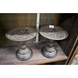 A pair of 19th century Elkington style bronze tazzas, on slate bases, 17.5cm high.