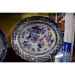 (HP) A large Chinese blue and white oval plate, 18th century, painted with flowers, 42cm wide.