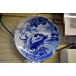 (HP) A large Japanese blue and white charger, Meiji period, 61cm diameter, (rim chip).