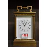 A good brass carriage clock, by Matthew Norman, with gong strike and push button repeat, height