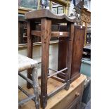 A Victorian fruitwood and elm stool, with saddle seat, and octagonal turned legs, 76cm high.