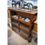 A early 20th century mahogany three tier sectional bookcase, 102.5cm wide.