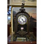 A late 19th century, Louis XV style, Boulle mantel clock, the enamel dial inscribed 'Hy Marc,