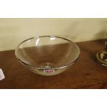 A Lalique clear glass bowl, with metal rim, 22cm diameter.