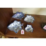 Four early 19th century pearlware leaf form pickle dishes, largest 16cm.