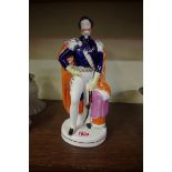 A Victorian Staffordshire pottery figure of Prince Albert, 27.5cm high.