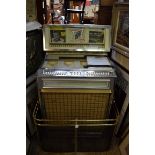 A vintage Jupiter E80 jukebox, circa 1960s, (no records, not currently working).