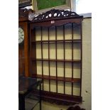 A mahogany hanging open shelf, 97 x 56cm.