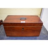 An early 19th century mahogany tea caddy, the interior with cut glass mixing bowl, 30.5cm wide, with