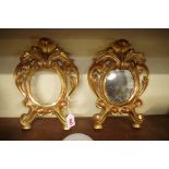 A pair of carved giltwood frames, 29cm high.