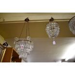 An old three tier chandelier; together with another bag chandelier.