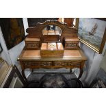 A late 19th/early 20 century Continental walnut bonheur du jour, 91cm wide.