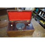 An early 19th century rosewood tea caddy, the interior with original glass mixing bowl, 31cm wide.