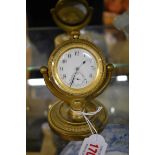 A gilt brass desk timepiece, 12cm high.