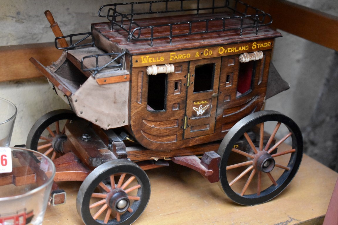 A small group of Wells Fargo commemorative items, to include a stagecoach and six glasses. - Image 2 of 4