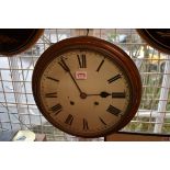 An antique mahogany circular wall clock, with painted dial, 36.5cm diameter, with pendulum.