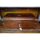 A 19th century rosewood and brass bound writing slope, 50.5cm wide, (with key).