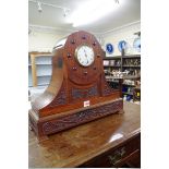 A novelty mahogany propeller timepiece, the enamel dial inscribed 'Examined by Dent...London', 40.