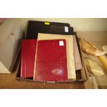 A collection of stamp albums and stock books.