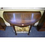 A pair of 19th century mahogany and crossbanded demi-lune console tables, 108.5cm wide.