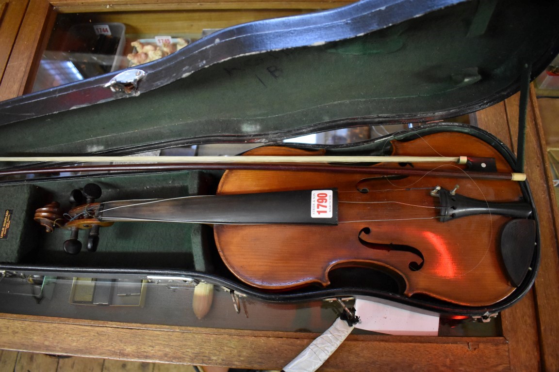 An antique Continental violin, with 14in back, with case and bow.