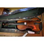 An antique Continental violin, with 14in back, with case and bow.