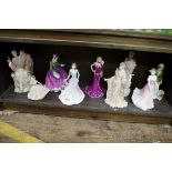 Nine various Royal Doulton, Coalport and Wedgwood figures.