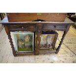 A 1920s oak two drawer side table, 113cm wide.