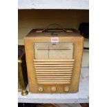 A vintage HMV model 1507 combined radio and turntable.