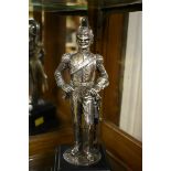 A filled silver figure of an Army Officer, on plinth base, total height 27.5cm.