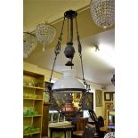 An impressive rise and fall ceiling oil lamp.