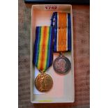 Medals: a World War I pair, to 23700 Pte E Richards, E Surr R, comprising War Medal and Victory