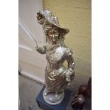 After E Rancoulet, a silvered metal figure of a lady, 99cm high.