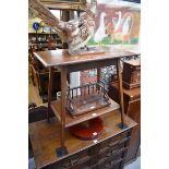 An Edwardian mahogany and satinwood crossbanded rectangular two tier occasional table, 68.5cm long.