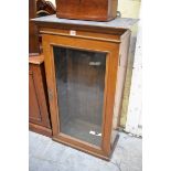 An old mahogany hanging bookcase, 55cm wide.