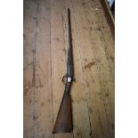 *WITHDRAWN FROM SALE* An antique single barrel percussion shotgun.