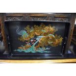 A Chinese lacquer tray, decorated with a five claw dragon, 48.5cm wide.