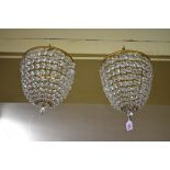 A pair of bag chandeliers.