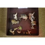 A collection of fifteen bronze and spelter miniature cold painted animals, in the manner of Franz