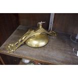 A brass tram bell, 28cm long. By repute from San Francisco.