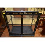 An ebonized cigar display case, 54.5 x 54cm.