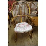 An Ercol 'Swan back' rocking chair.