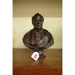 After Carlo Marochetti, a bronze bust of a gentleman, on integral socle, 20.5xm high.