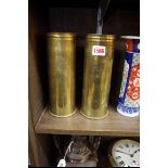 Two World War I brass trench art vases, 22.5cm high.