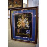 An embroidered military coat of arms, 38 x 28cm.