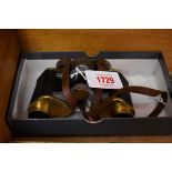 A pair of World War II period Bausch & Lomb binoculars, bearing plaque inscribed ' R.W.A.F.F (