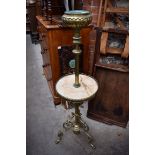 A brass and onyx tripod lamp, (lacking oil lamp fitting).