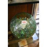 A large quantity of glass marbles, in glass vase.