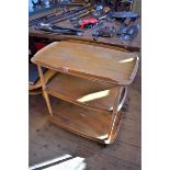 A vintage Ercol three tier trolley, 70cm wide.